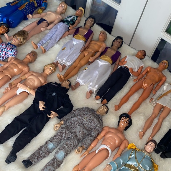 Log of 23 boys dolls